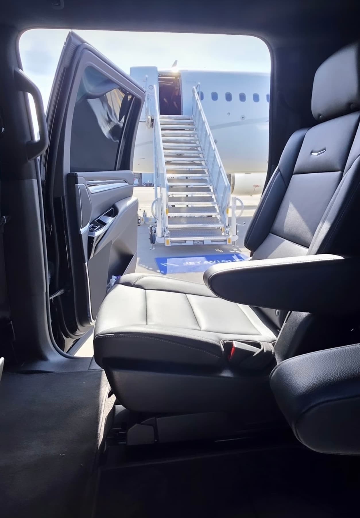 Black luxury SUV on approach at Miami International Airport
